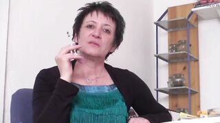 Brunette hair aged bitch smokin' a cigarette