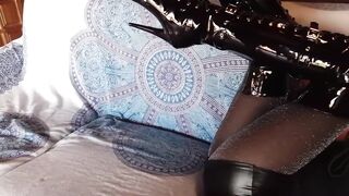 Total ebony with fishnets hose and boots over the knee