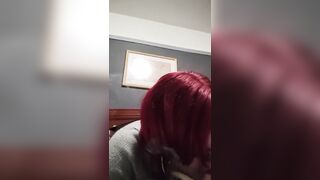 Strap wrapped around neck and screwed coarse