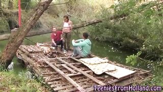 Tiny Dutch babe with large, natural titties is having a male+male+female trio, in the forest