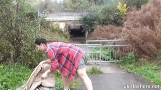 Flashing her large titties and bulky snatch