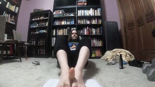 Obese male gives his sex toy a footjob