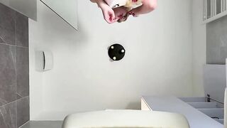 Hawt cutie cute golden-haired excited cutie in pink pants and with a satin nightie does the bath routine in advance of going to the couch