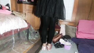 Cute T-cutie in frilly suit and ebony tights showing off her toenail polish