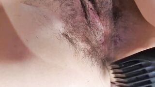 eighteen year old Oriental teen shaves her bush then uses her shaver to bang her constricted juicy twat