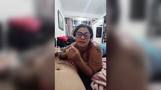 The redhead masturbates her spouse and tells him stories until that guy ejaculates in her throat.