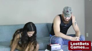 This determined girl proves brains in a Disrobe Freeze game