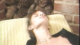 Breasty sweetheart slides fingers unfathomable inside her snatch whilst on the daybed