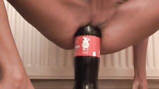 Slender doxy banging massive bottles