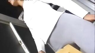 Oriental Nymph Humps a Desk