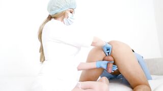 Breasty Doctor milking the prostate. Stuck her finger up the butt
