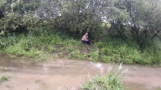 cutie has pleasure in the mud in a blue suit