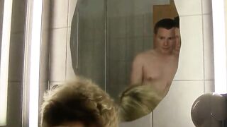 Older German golden-haired with short hair is taking a shower whilst her partner is getting lewd