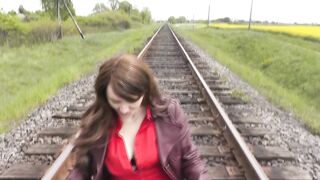 Undressed in public. Woman out of pants positions near teach. Piddle public. Outdoor