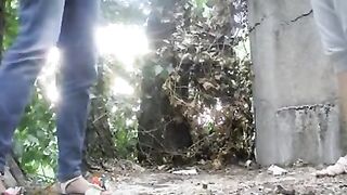 Ladies were peeing in the forest, not knowing that anybody was watching 'em with a smile