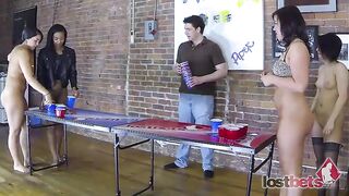4 Marvelous gals play a game of undress beer pong