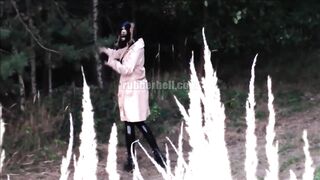 RubberDoll in the forest in total latex enclosure