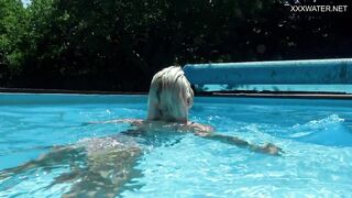 Outdoor swimming pool erotics with bare Zazie