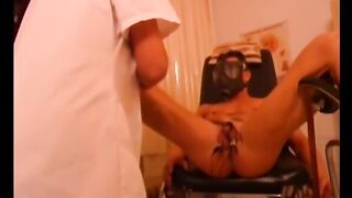 Thrall Maskejoe is tortured by the nurse at the gyne chair with electric shocks