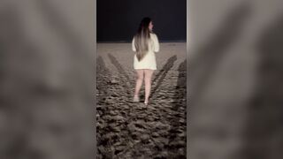 Beach walk in short costume