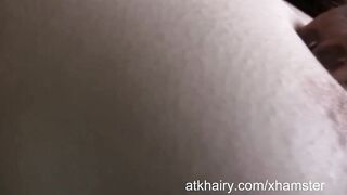 Hirsute Olivia cleans up the kitchen.