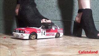 Female-Dom Calista sprays a miniature sports car