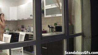 The sexy hotty-next-door is exposed and somehow messing with me throughout her kitchen windows