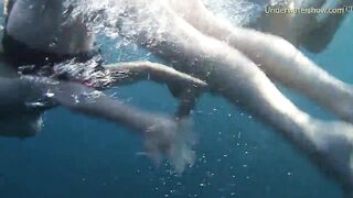 Stripped angels on Tenerife having joy in the water