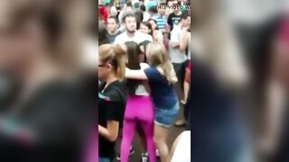 lesbian babes giving a kiss wildly in a outdoor party