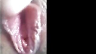 Bating Her Moist Clitoris and Squirting Admirable and Sexually Excited