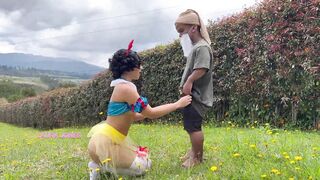 Laura Jones as Snow White steals milk from a careless dwarf