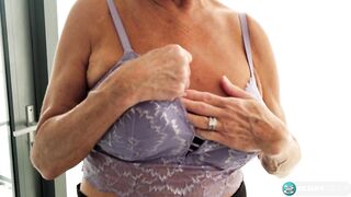 Our oldest GILF ever returns so show off her melons and finger