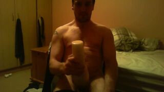 Sitting on chair watching porn banging a felsh light untill I ejaculate