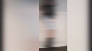 Crossdresser posing in hawt pants, boots, fishnet and corset, hawt red nails