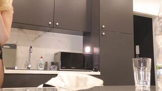 Sexy and hawt taut twat golden-haired wife in the kitchen shows her sheer shiny ebony hose and takes off pants